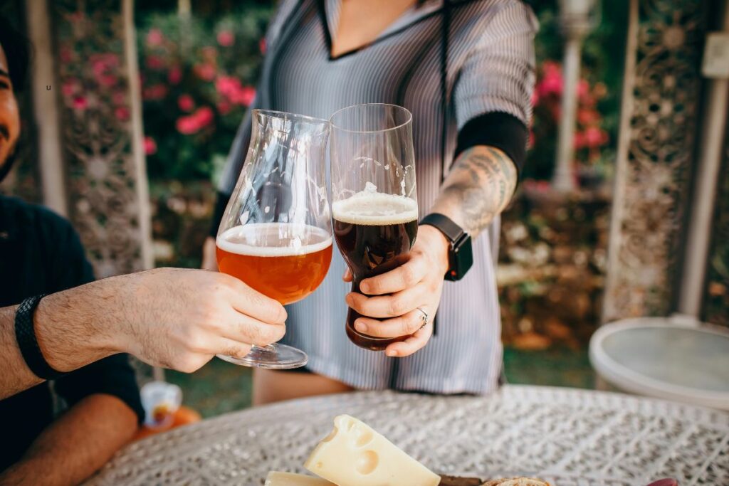 People toasting craft beers at a brewery in Grand Rapids, Michigan