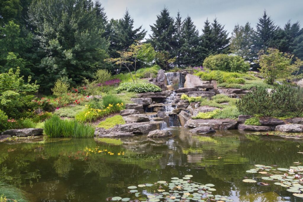 Waterfall and pond at Frederik Meijer Gardens in Grand Rapids, Michigan